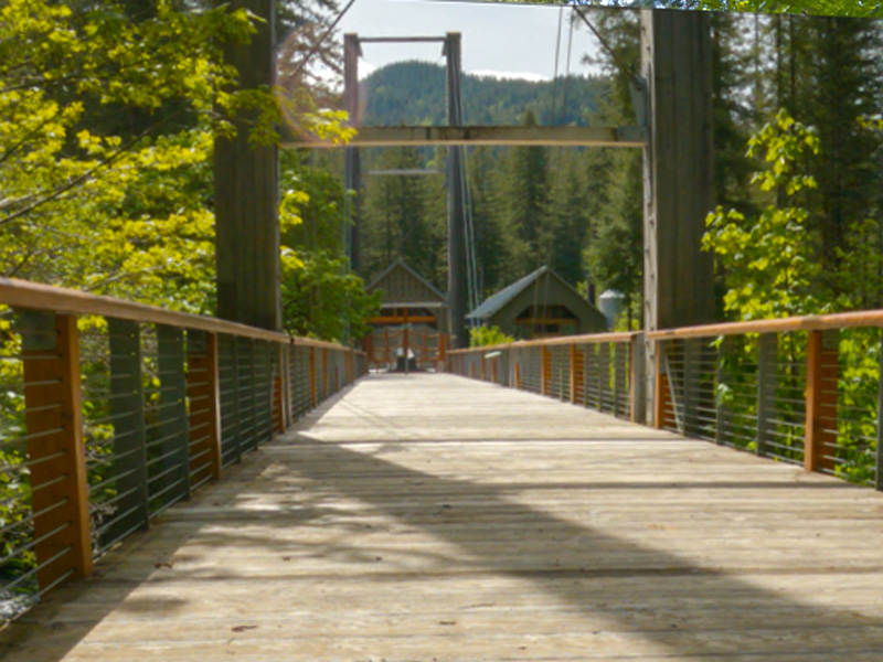 The suspension bridge to the Tillamook Center from Jones Creek