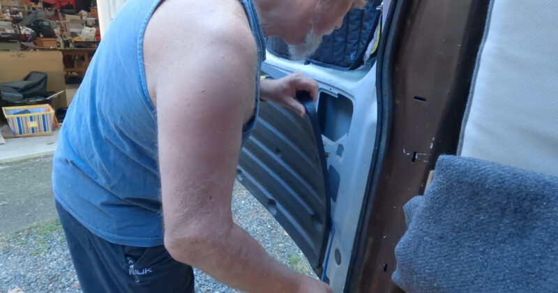 Removing the interior panel from the van door